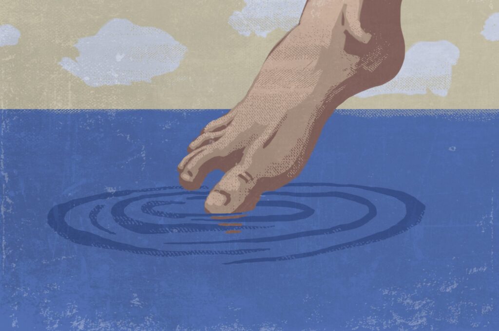 Image of a water idiom with a toe dipping in water.